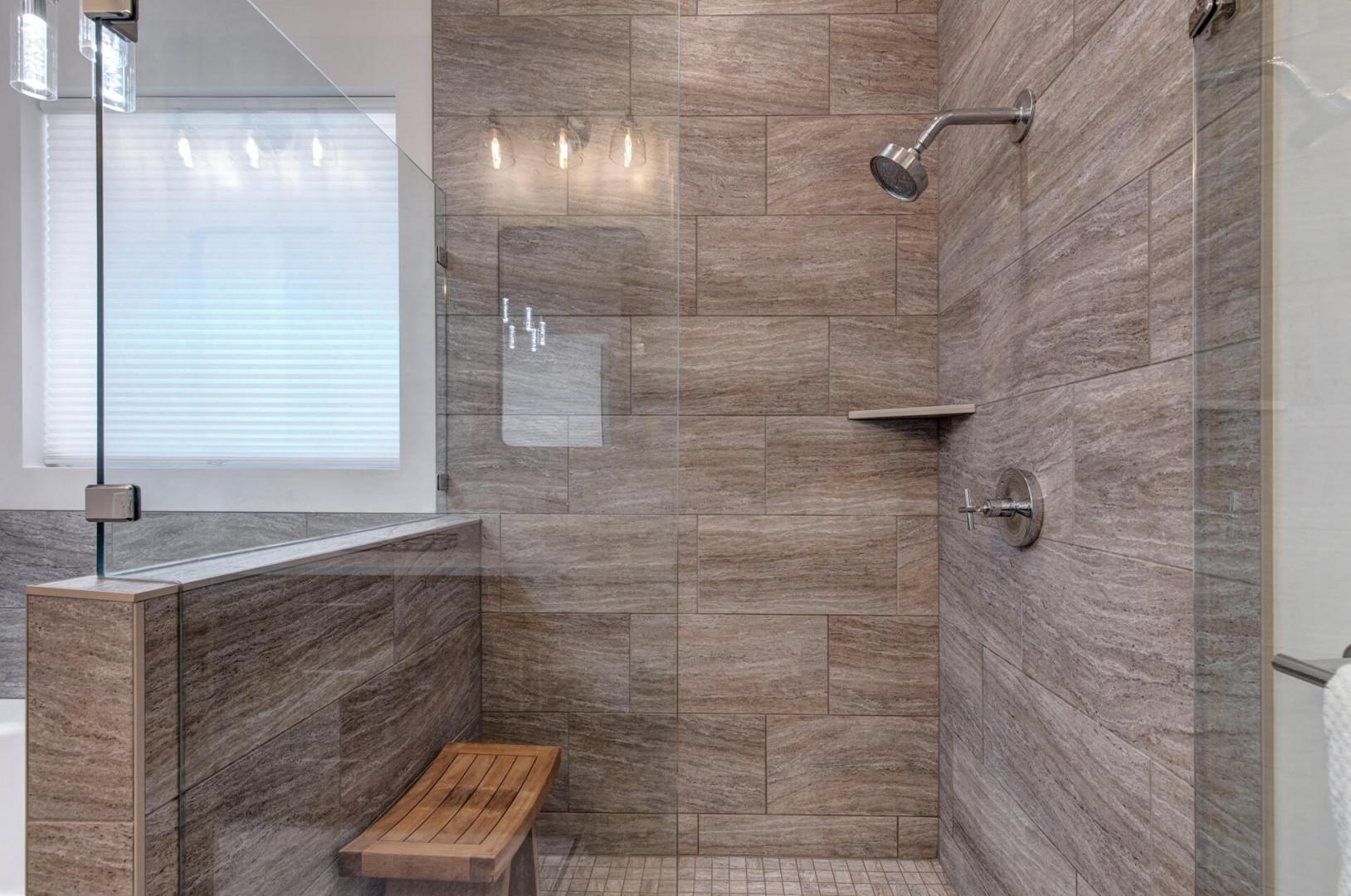 Deer Springs 12797: The primary ensuite bathroom offers a glass-enclosed shower.