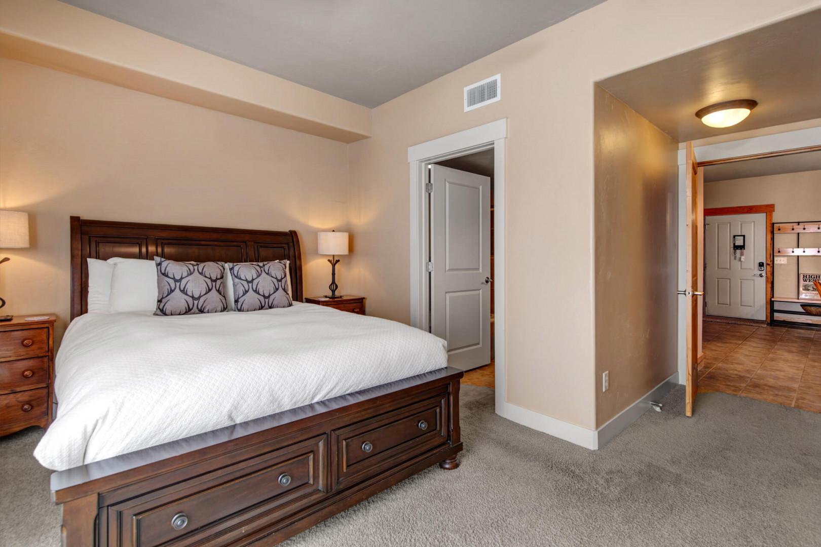 Sink into plush bedding and unwind in your peaceful bedroom retreat. Thoughtful touches like an adjoining entryway and climate-controlled comfort ensure you'll wake refreshed for your next adventure.