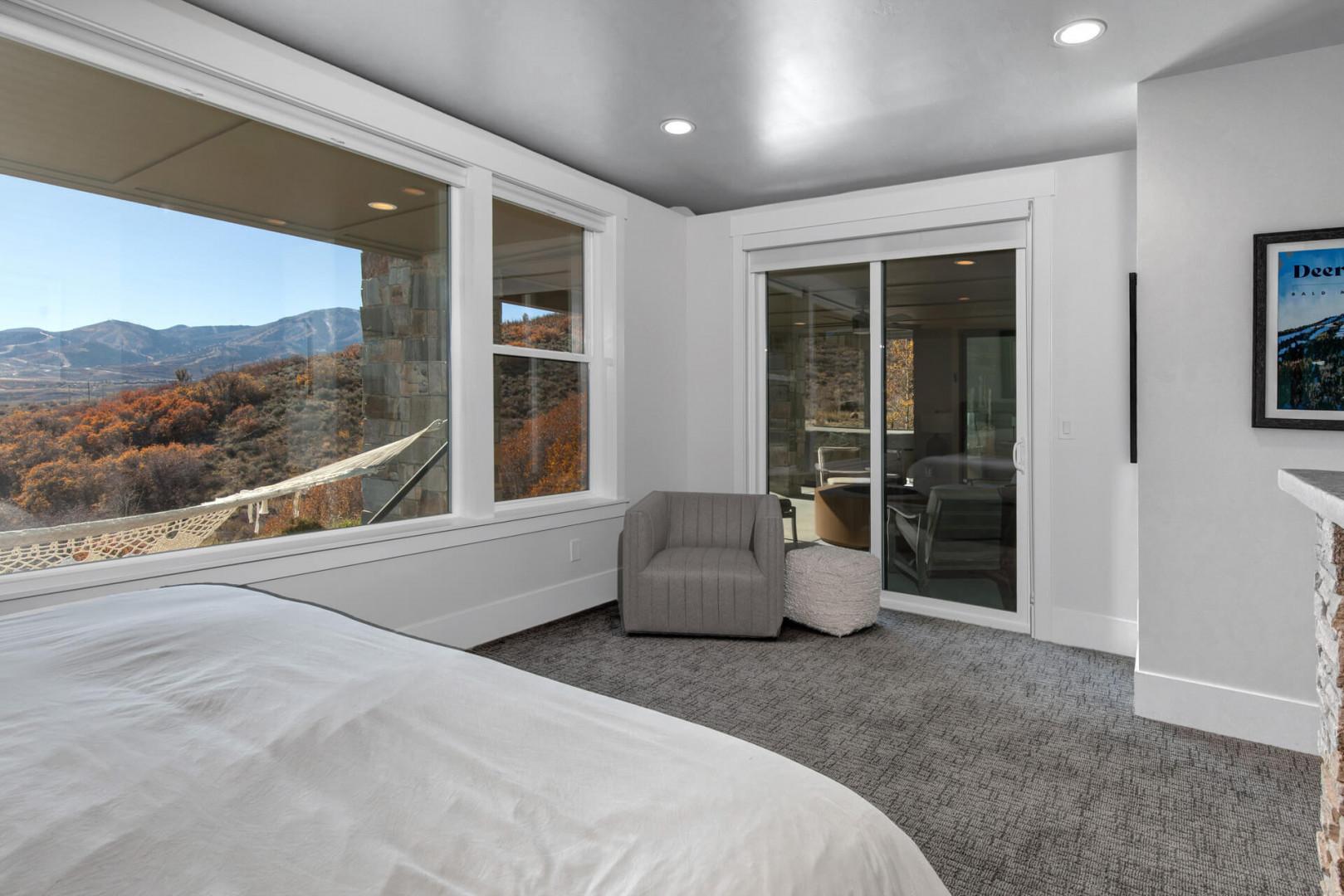 Deer Springs 12797: A relaxing chair with a footstool invites guests to unwind in comfort and style.