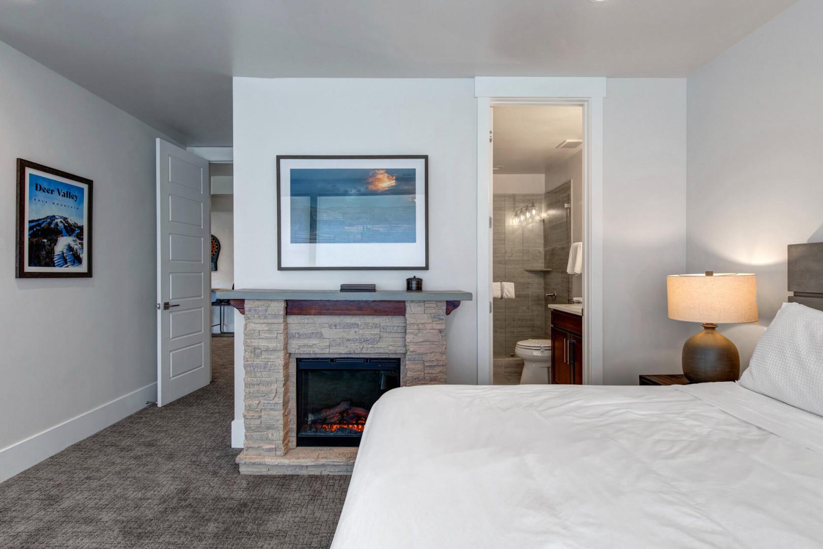 Deer Springs 12797: The second guest bedroom, located on the lower level, includes a full ensuite bathroom with a convenient step-in shower, providing both comfort and style for your stay.
