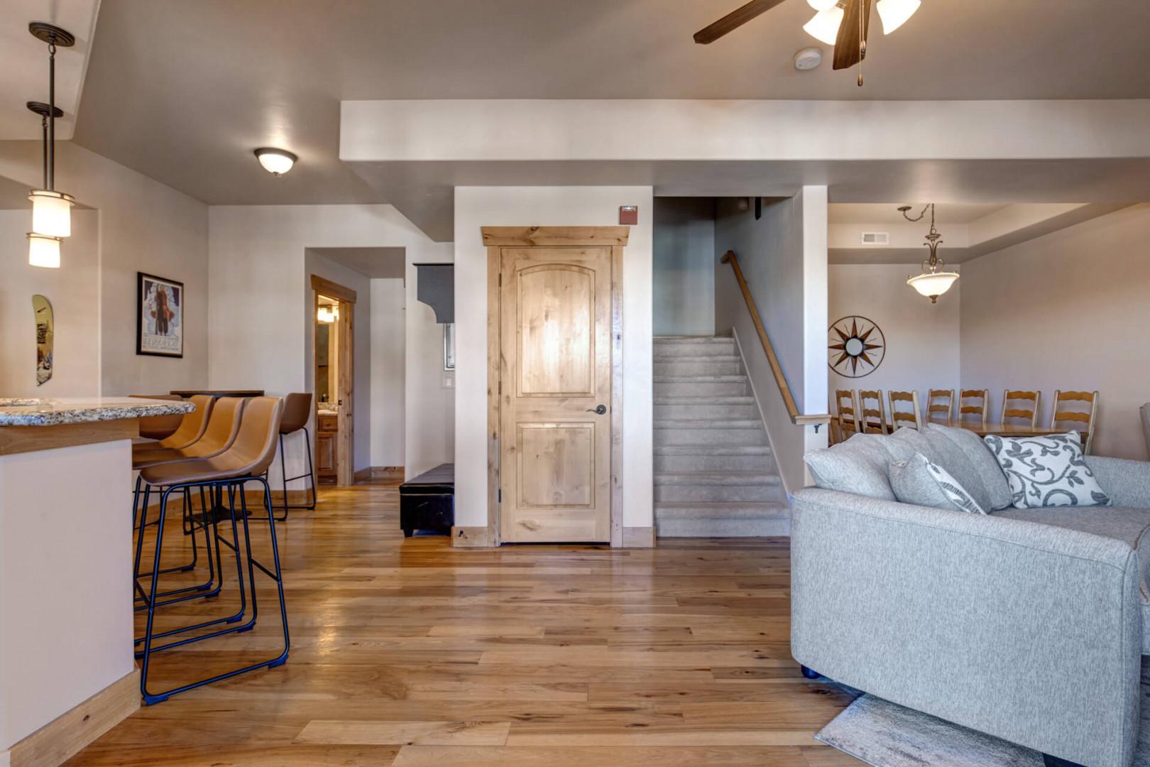 Relax in your spacious open-concept living area with soaring ceilings, gleaming hardwood floors, and modern comfort throughout.