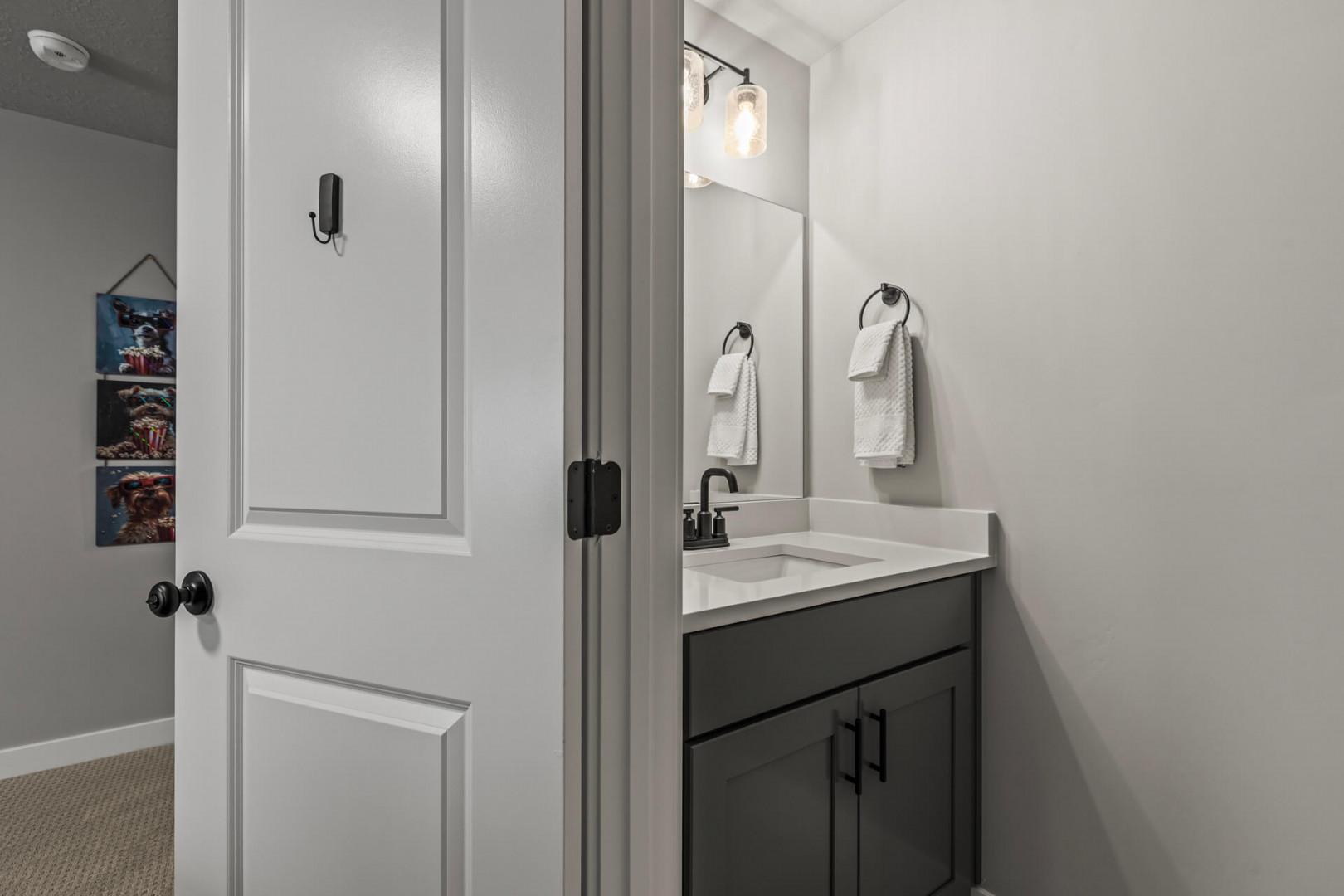 Refresh in your private bathroom with crisp white towels and modern fixtures that make your morning routine feel effortless.