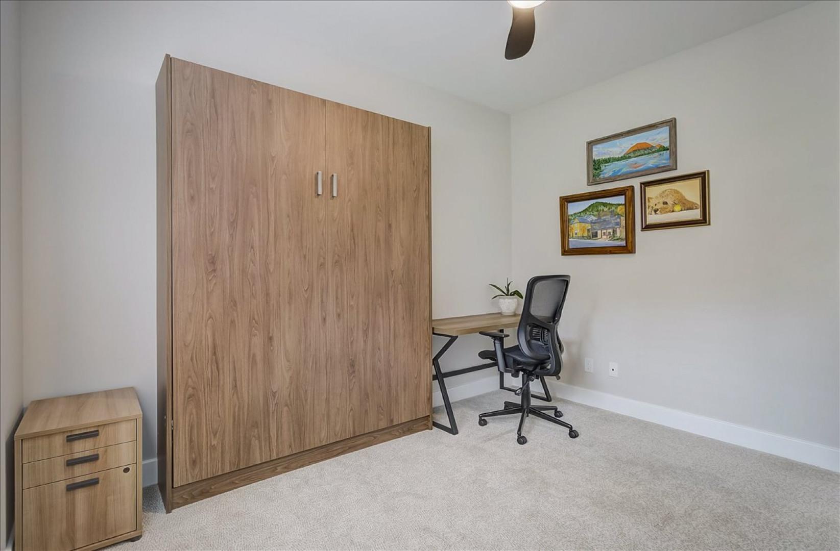 Black Rock Ridge 14202: Minimalist office setup with sleek desk and comfortable chair.