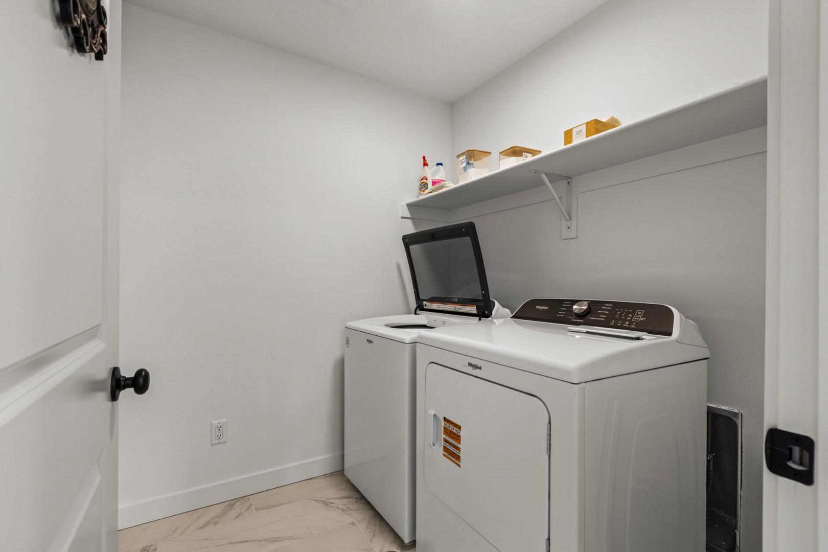 Your private laundry room keeps your vacation wardrobe fresh with full-size washer and dryer, plus convenient storage shelving for supplies.
