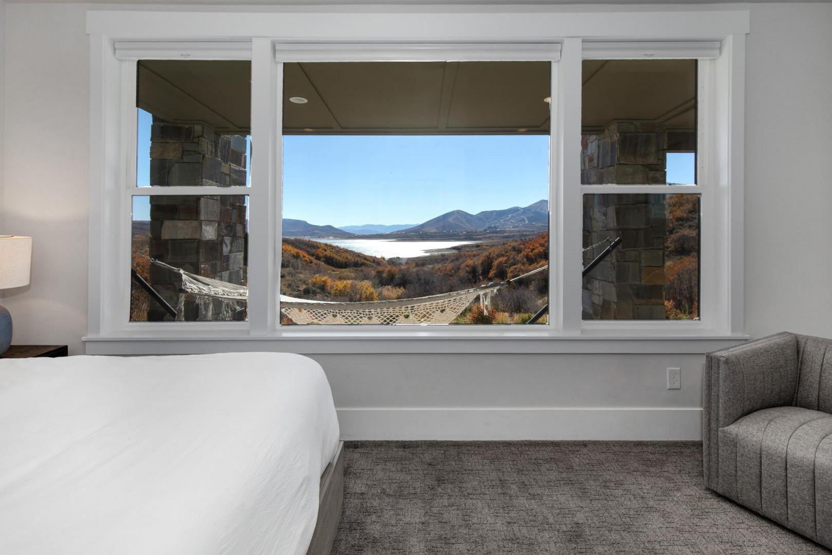 Deer Springs 12797: The second guest bedroom offers a king-size bed and large windows showcasing stunning mountain views.