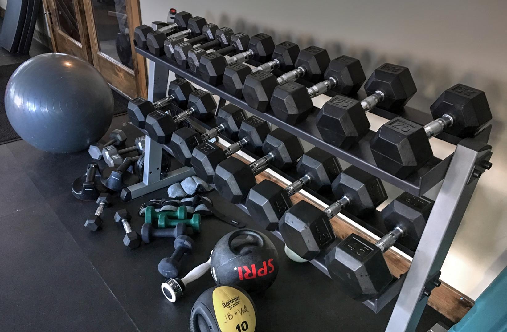 Stay active during your getaway with a fully equipped fitness area featuring free weights, dumbbells, kettlebells, and stability balls to keep your workout routine on track.