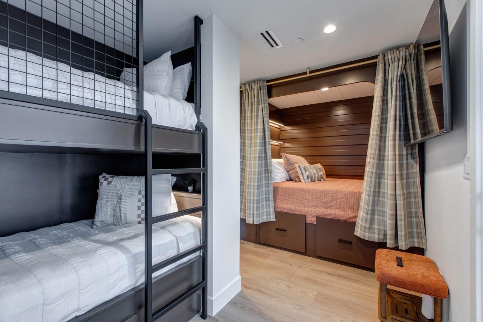 Sleep soundly in your cozy bunk room with built-in storage and privacy curtains for a restful night.
