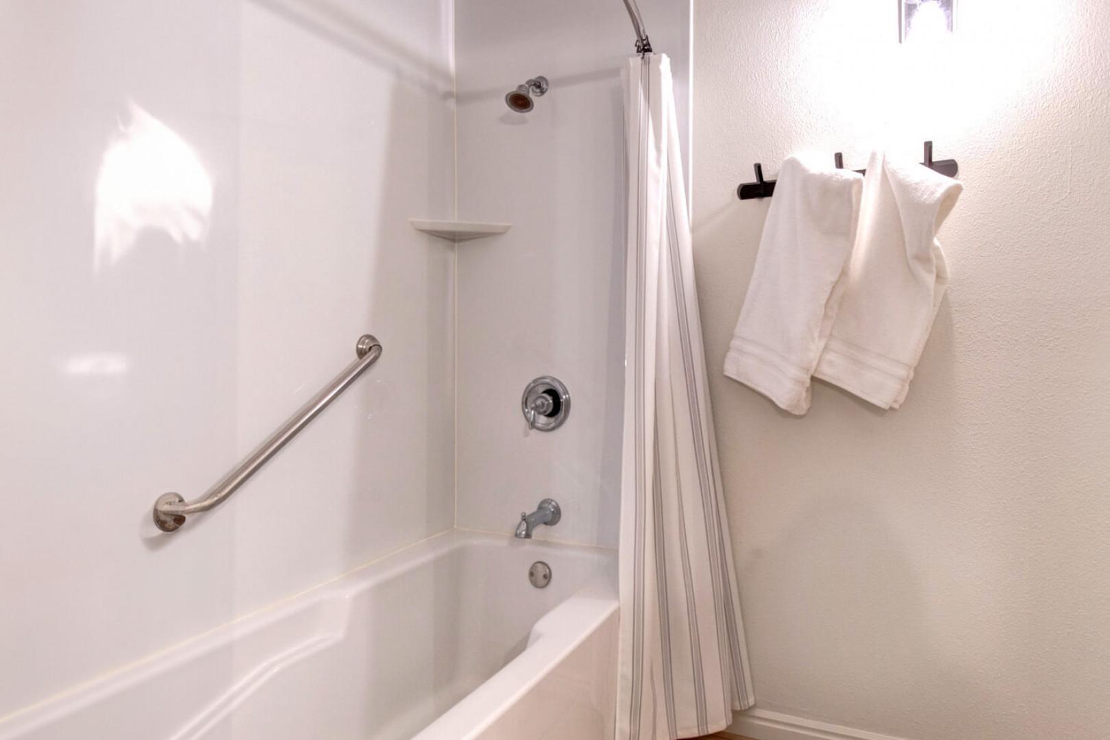 Modern tub shower combo for a relaxing bath experience.