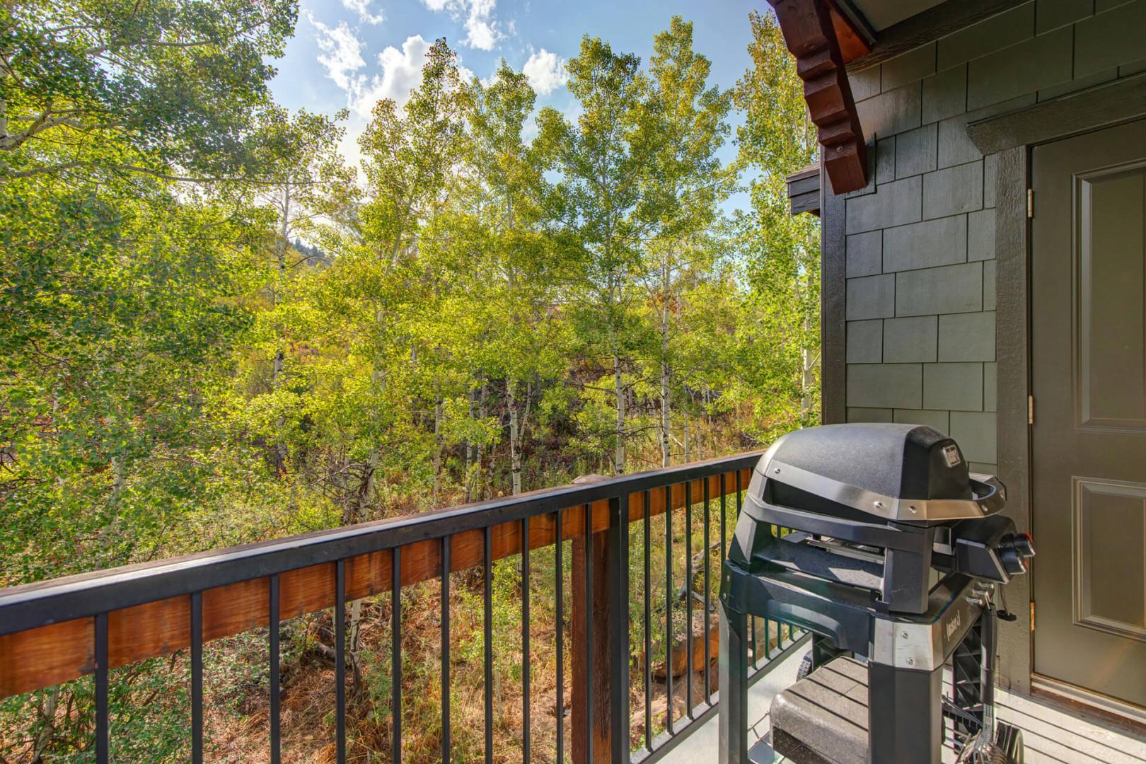 A gas grill awaits on your private balcony, where towering aspen trees frame your peaceful retreat. Fire up the BBQ and dine al fresco while soaking in nature's beauty.
