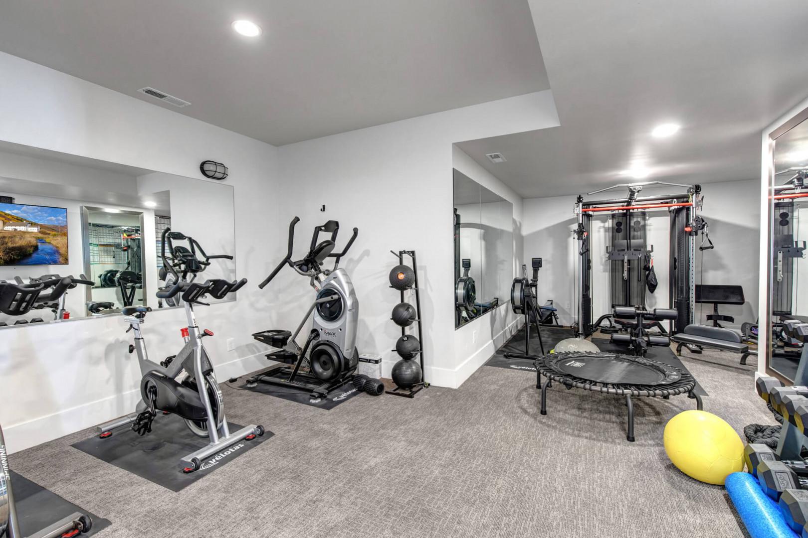 Deer Springs 12797: The luxury in-home fitness room is equipped with rowing machines and power plates.