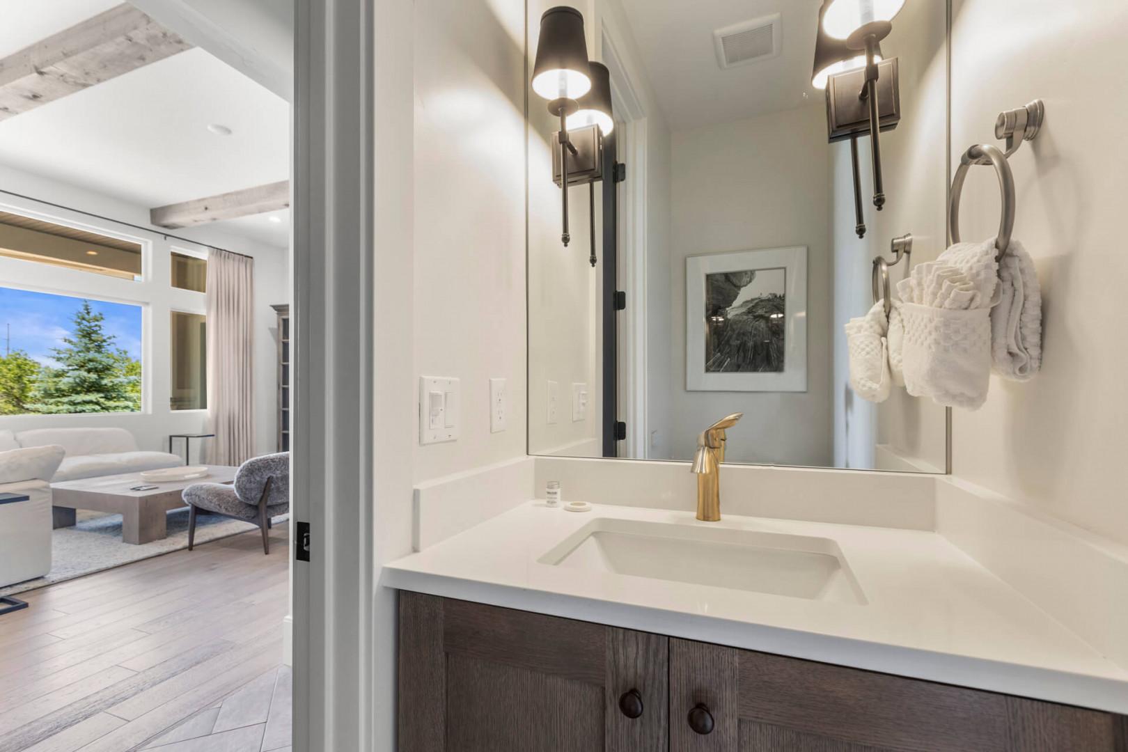 Jordanelle Estates 13200: Main level half bathroom off of the kitchen/living room