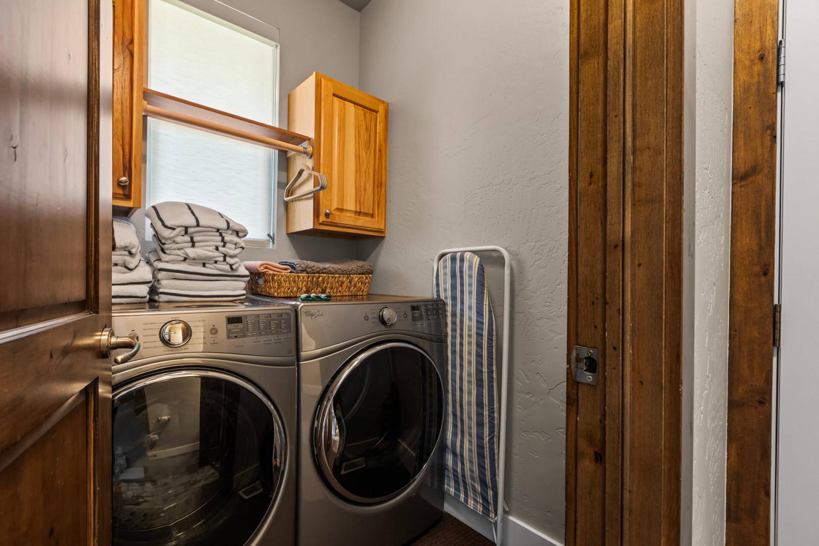 Your private laundry room makes extended stays effortless with modern washer and dryer, plus thoughtful storage and hanging space.