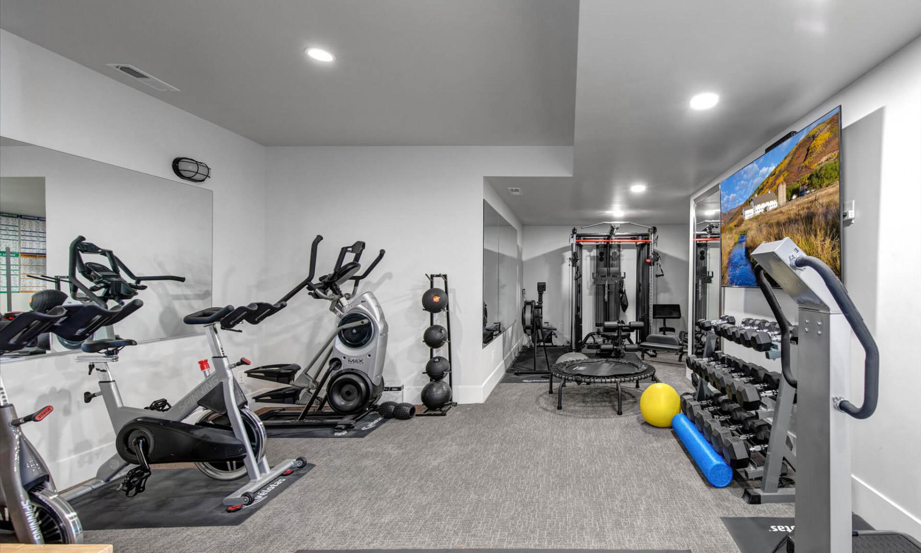 Deer Springs 12797: State-of-the-art in-home fitness room equipped with high-end amenities.