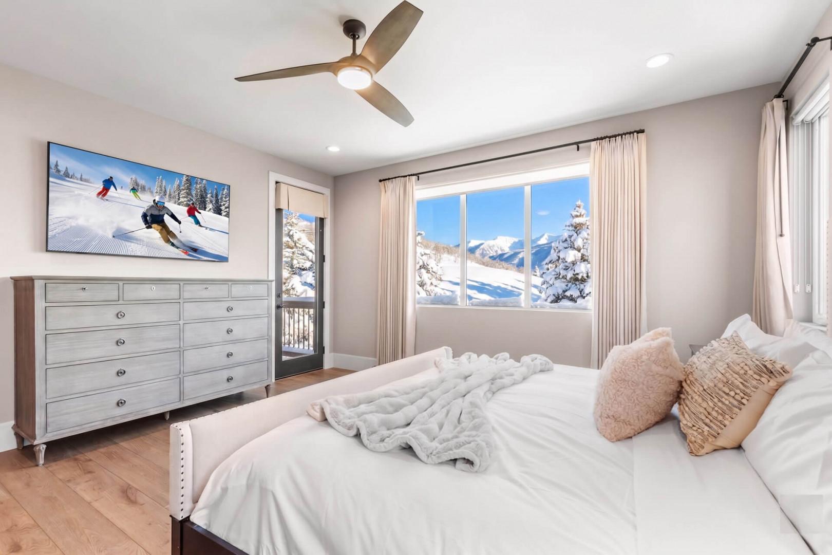 Jordanelle Estates 13200: Main level primary bedroom (winter)