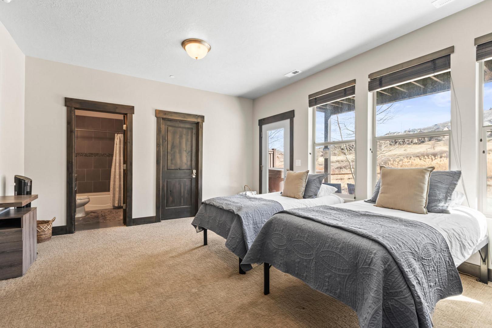 Wake up in this peaceful bedroom with panoramic mountain views and rustic charm that makes every morning feel like a retreat.