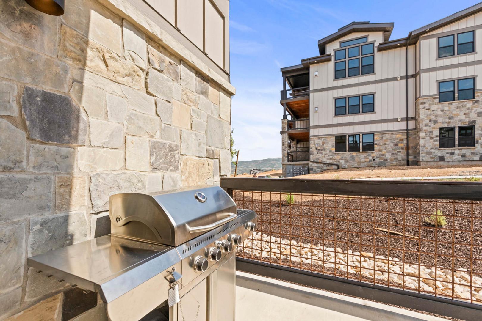 Fire up your private grill on this spacious patio, perfect for enjoying mountain air and outdoor dining under open skies.