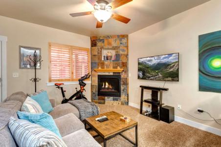 Vacation Rentals in Park City at Bear Hollow Lodges 1205: Living Room with TV and Cozy Gas Fireplace