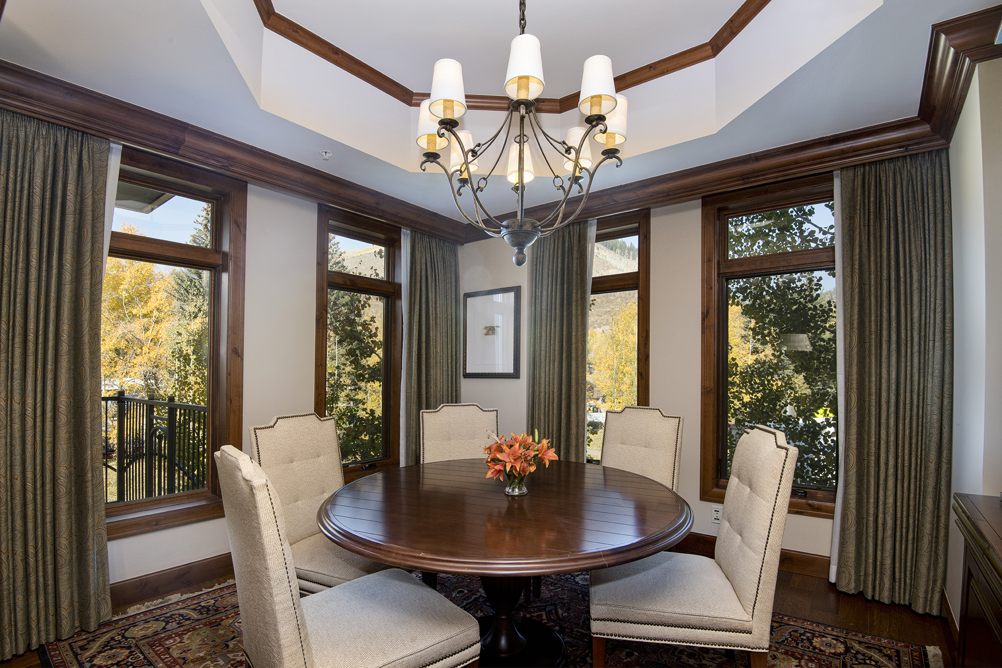 Separate dining room surrounded by mountain views