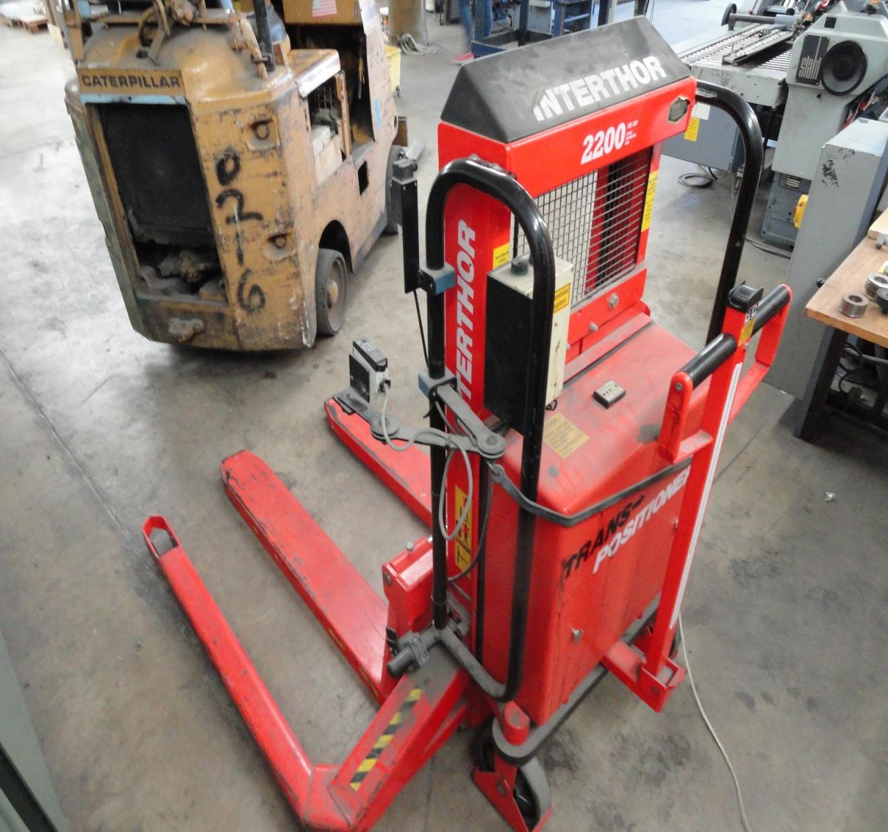 Lot 42 Interthor Manual Straddle TransPositioner Electric Pallet
