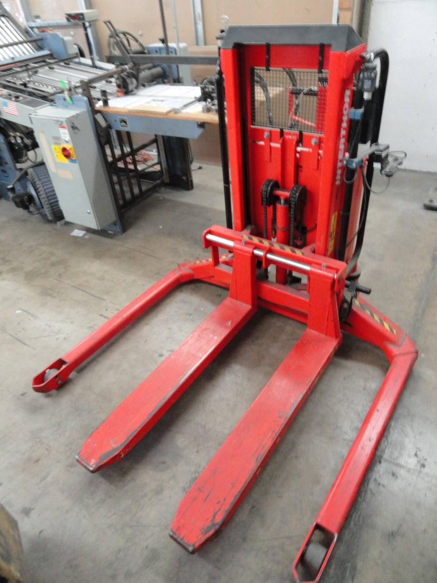 Lot 42 Interthor Manual Straddle TransPositioner Electric Pallet