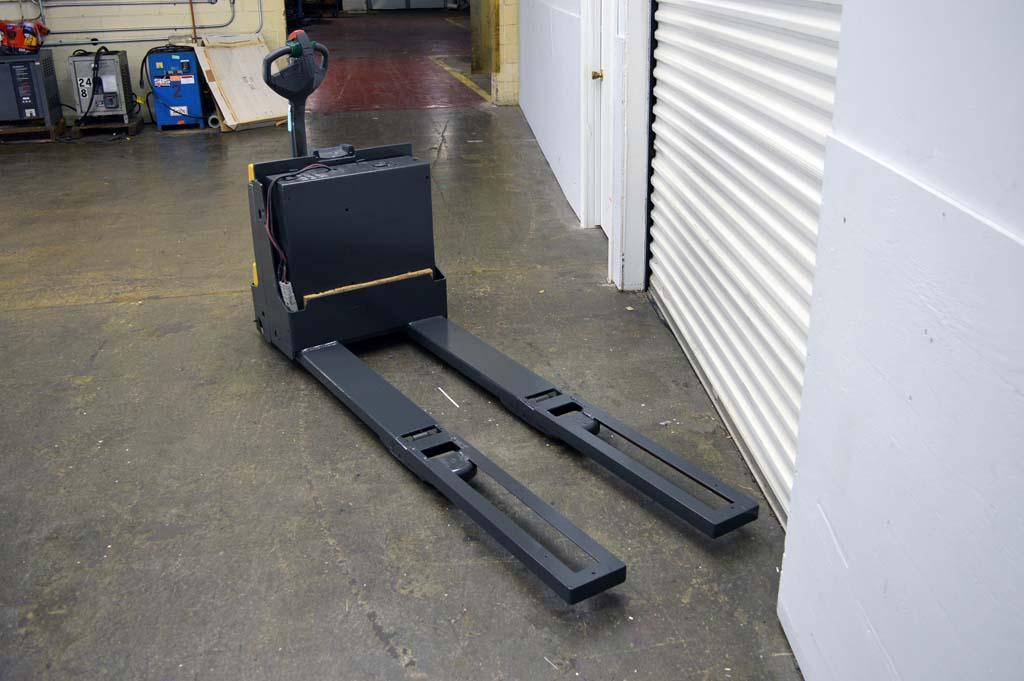 Lot 7 Cat 4500 lb Electric Pallet Jack with Built in Charger, and
