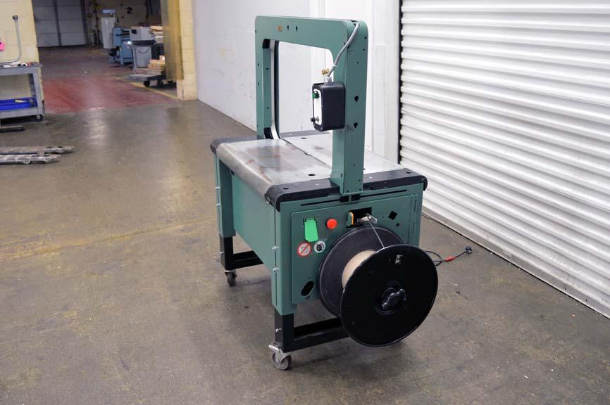 Lot 2 2005 Signode Semiautomatic plastic strapping machine LBX2300