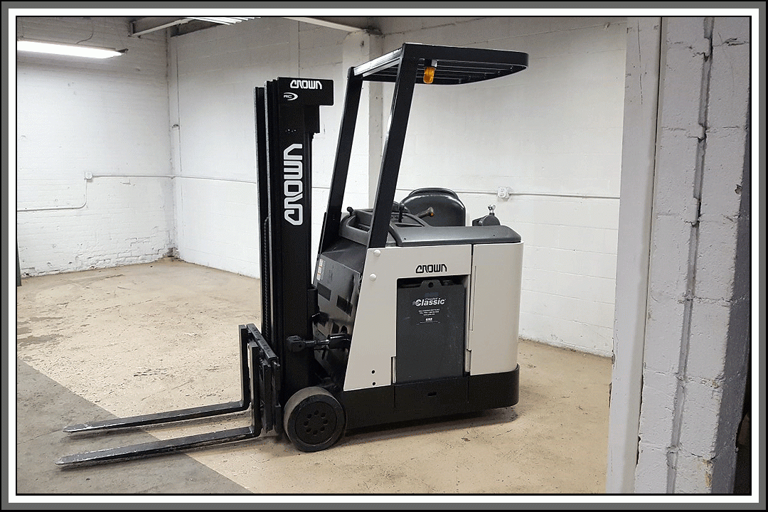 Lot 46 Crown RC302030 Stand Up Electric Forklift Click for Video