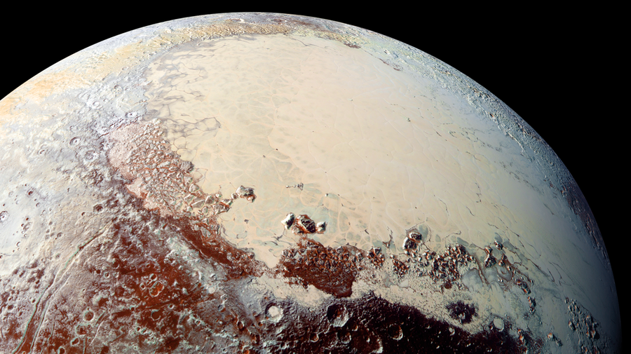 The heart-shaped glacier on Pluto's surface is made of nitrogen, carbon monoxide and methane. Researchers aren't sure how it formed. (NASA/JHUAPL/SwRI)