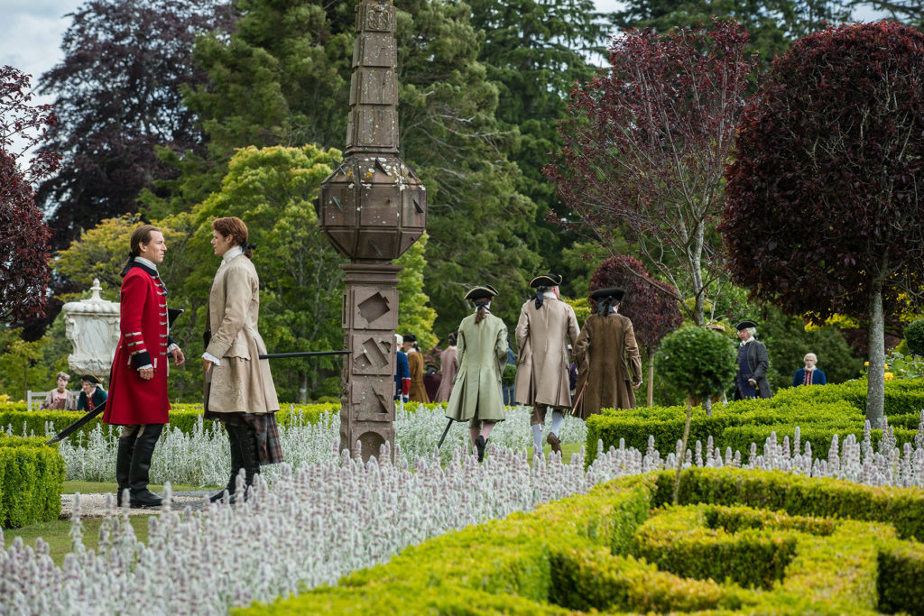 Tobias Menzies (as Black Jack Randall) and Sam Heughan (as Jamie Fraser
