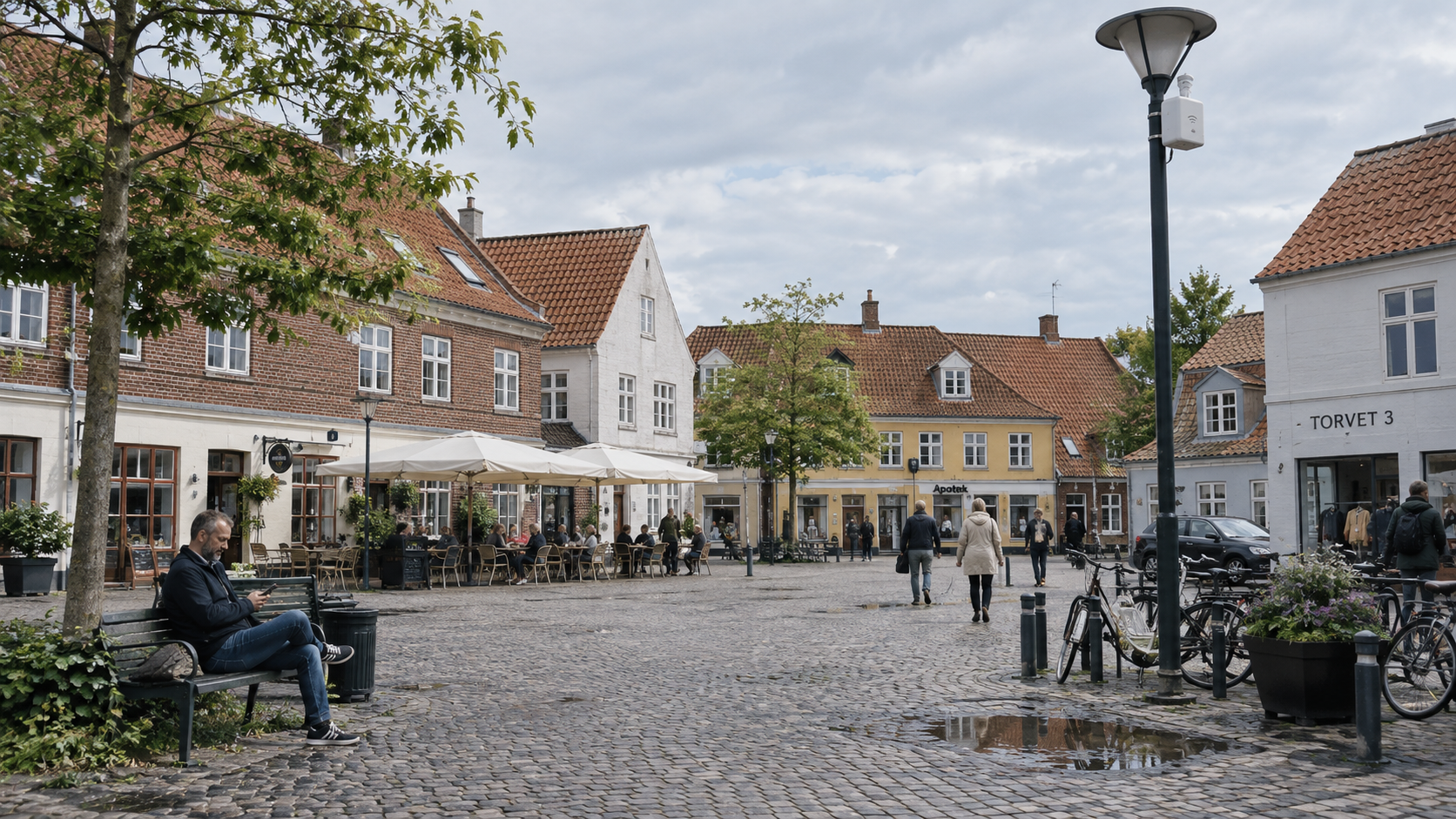 Torv med udendørs Wi-Fi-dækning og udeservering