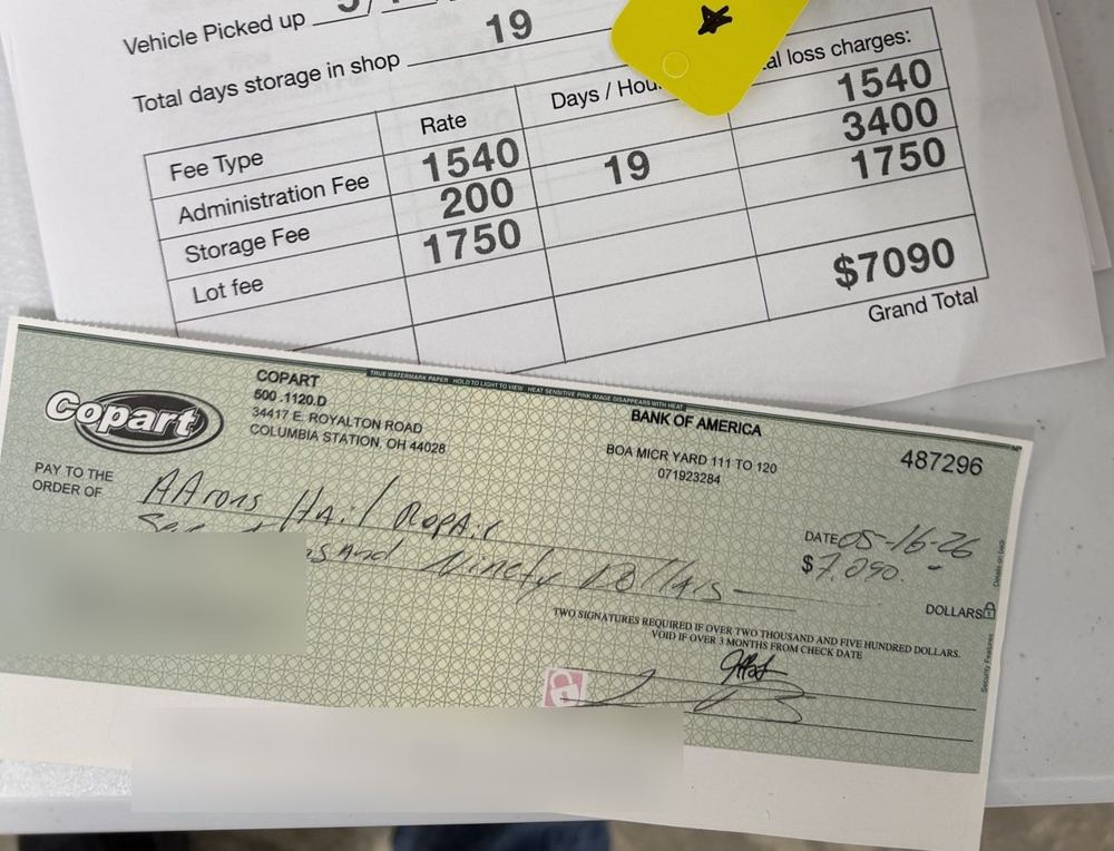 Total loss invoice and check for $7,090.00, 2026 Chrysler Pacifica