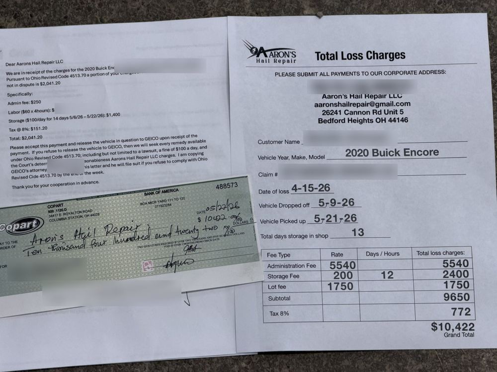 Letter disputing the bill and threatening a lawsuit, next to the Copart check for the full $10,422 and the shop’s total loss invoice
