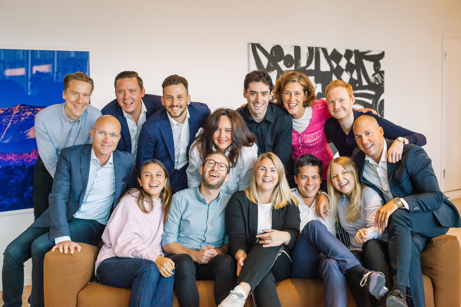 The Dicopay team seated together around a table