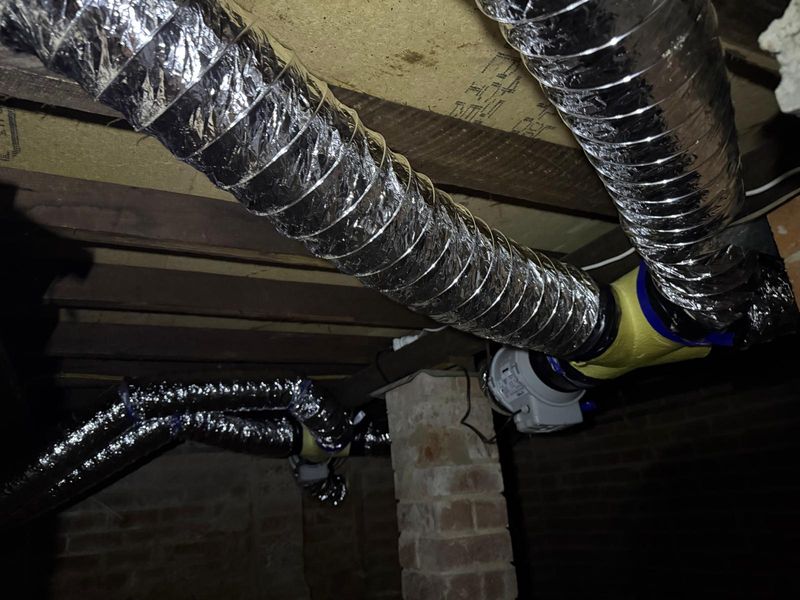 Subfloor ventilation work completed under a home