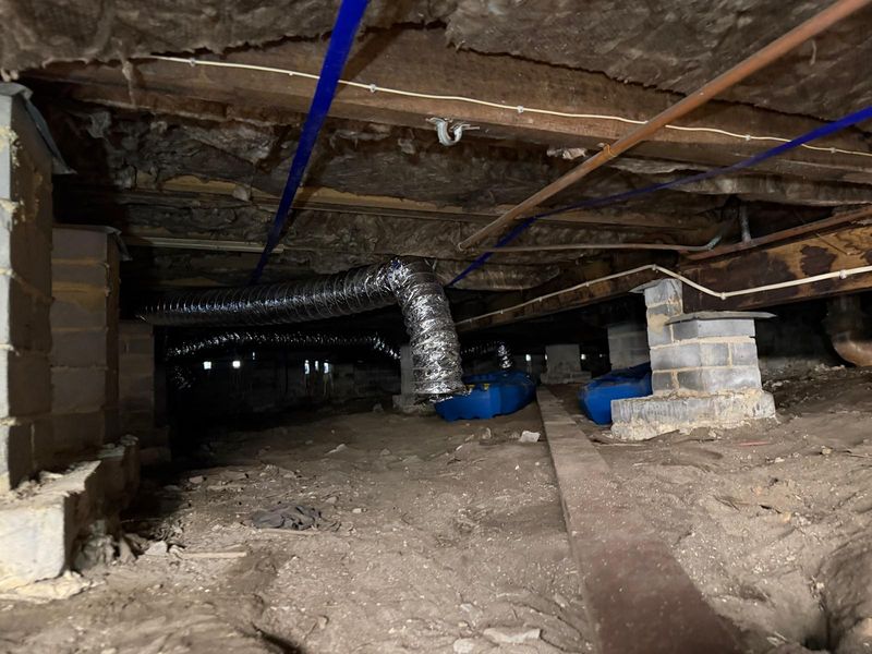 Ducting and fan setup under a suburban Sydney home