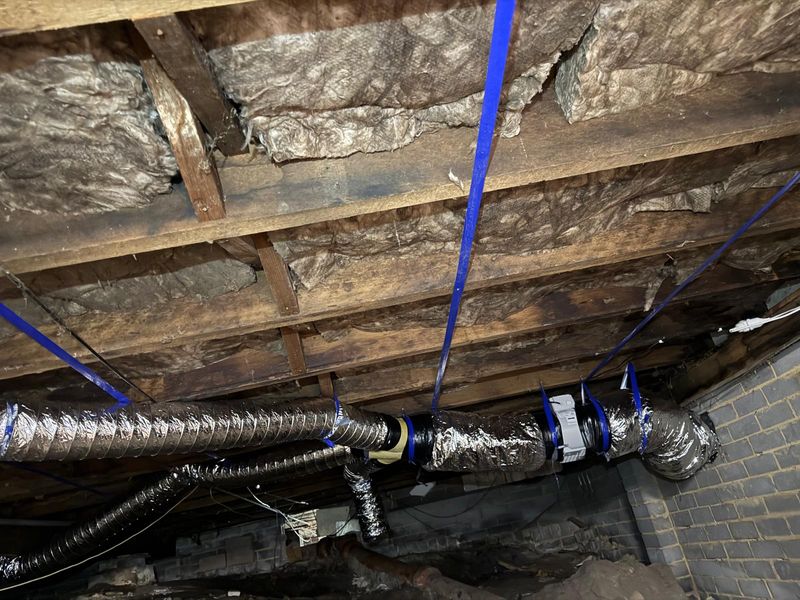 Completed subfloor ventilation system install