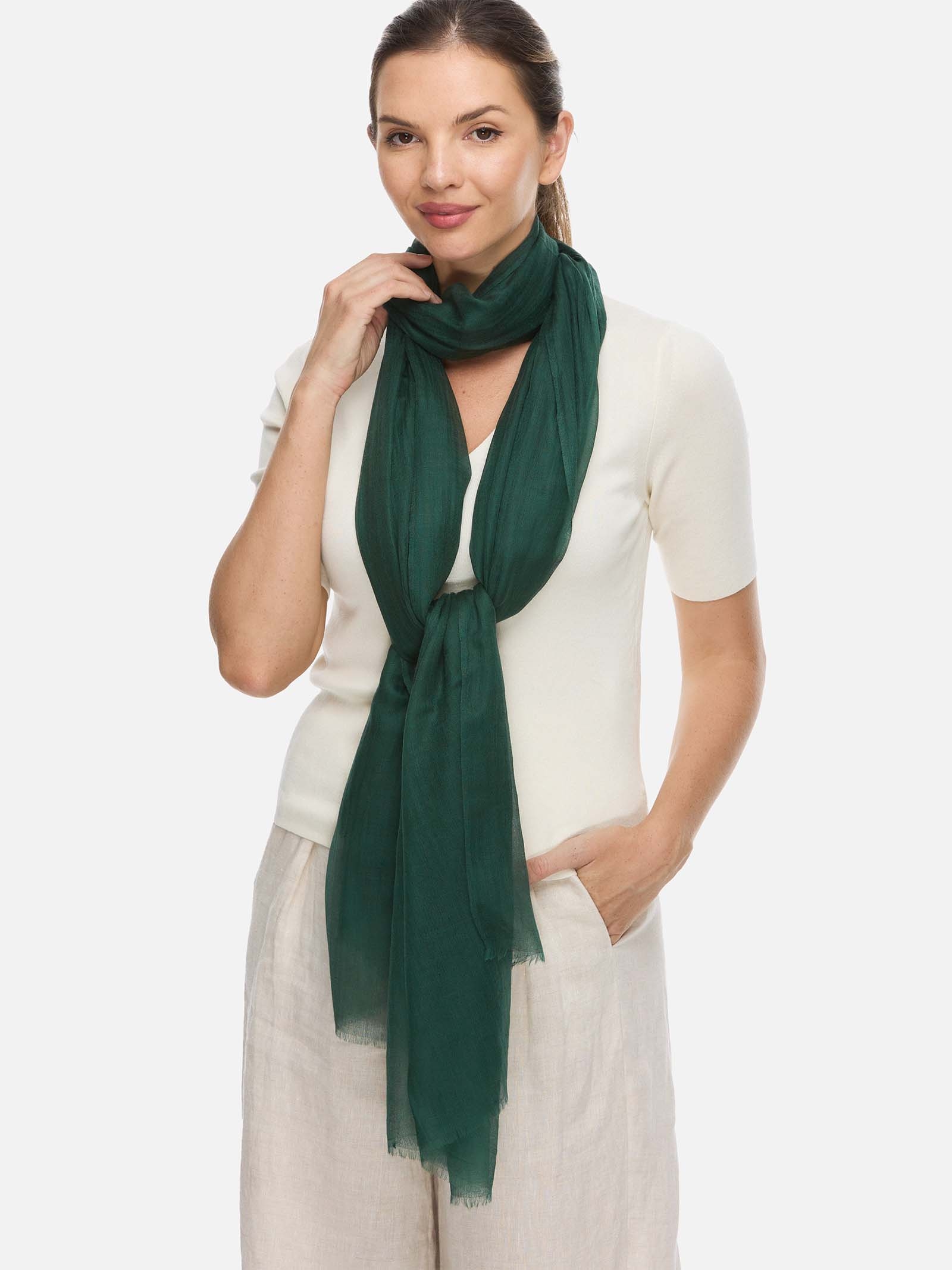 Emerald Green cashmere scarf styled with a cream outfit.