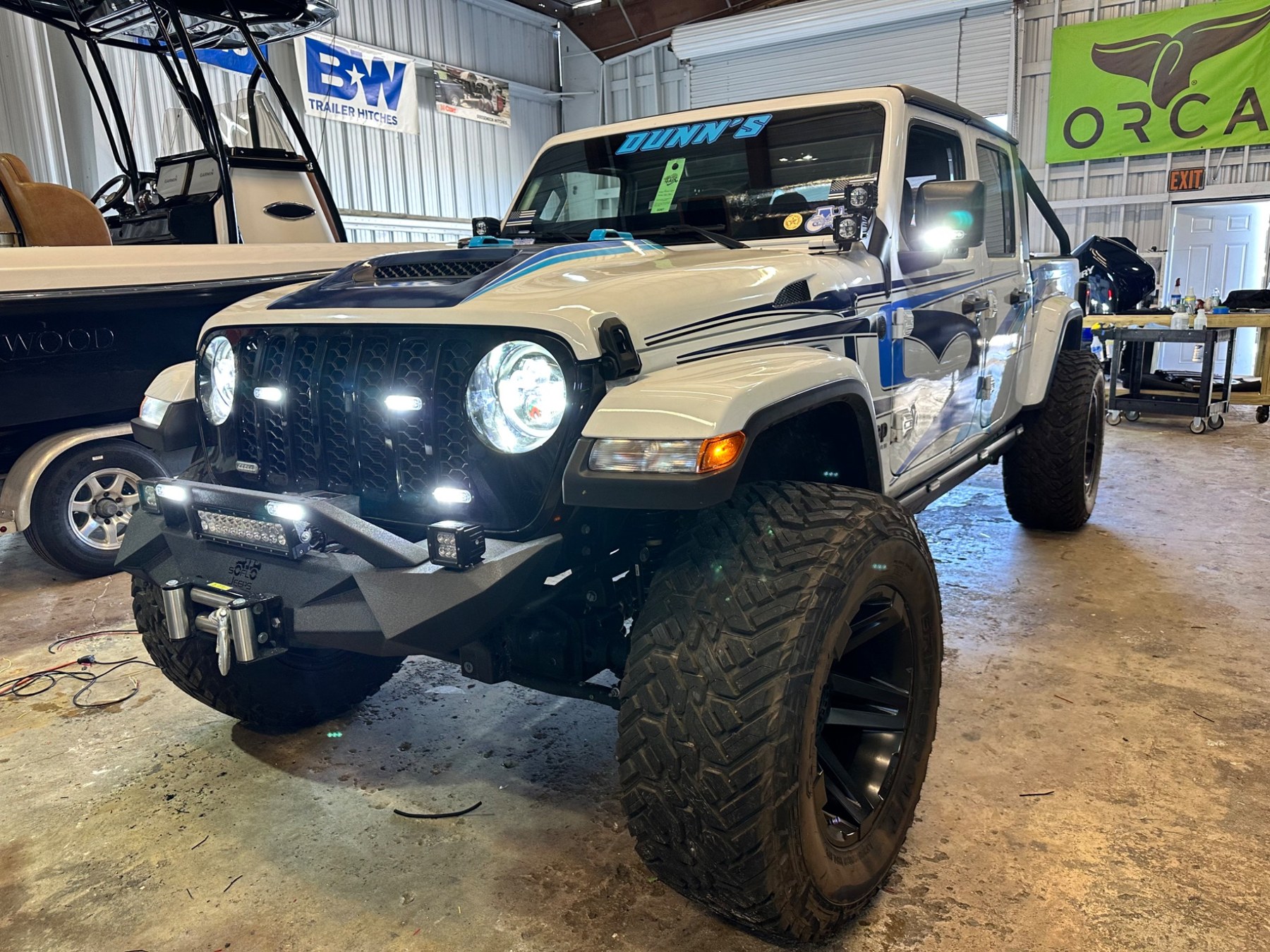 Custom Jeep headlights, grille and auxiliary lighting