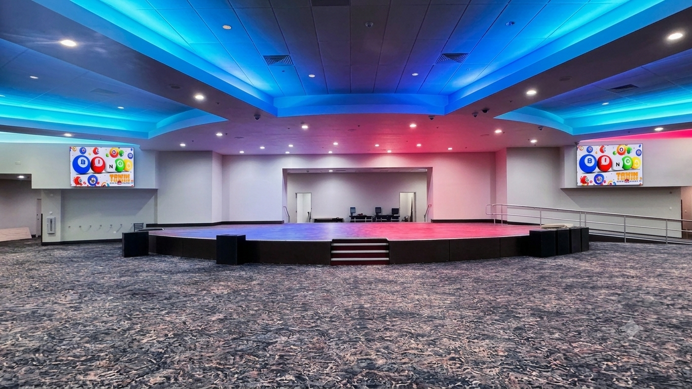 Tachi Palace bingo hall after the refresh — both LED walls lit with the BINGO graphic, mint cove glow, and the room brought to life
