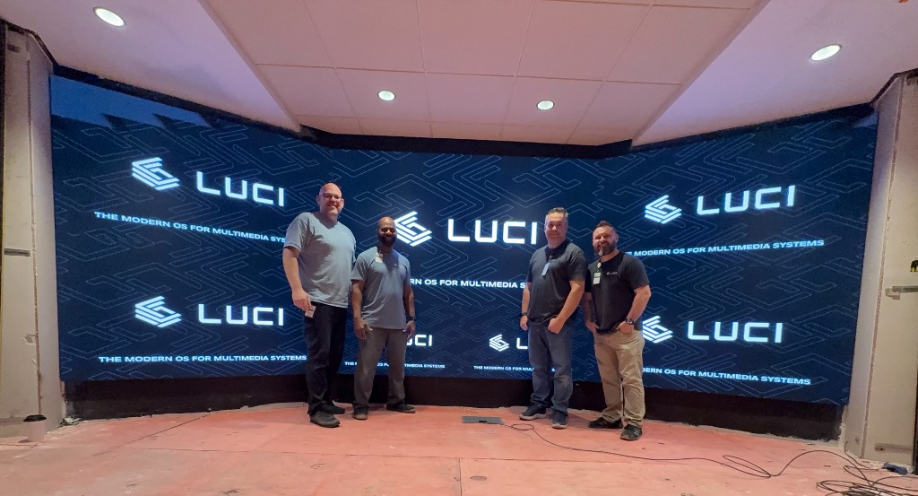 The LUCI team in front of the completed 106&rsquo; x 20&rsquo; curved LED wall at Aliante Casino + Hotel + Spa