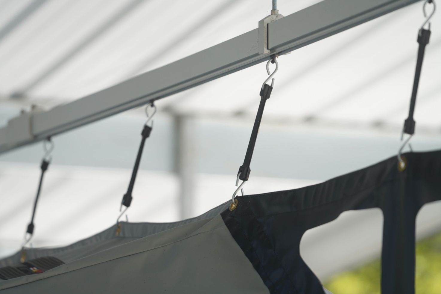 Close-up of the track hooks and tensioners