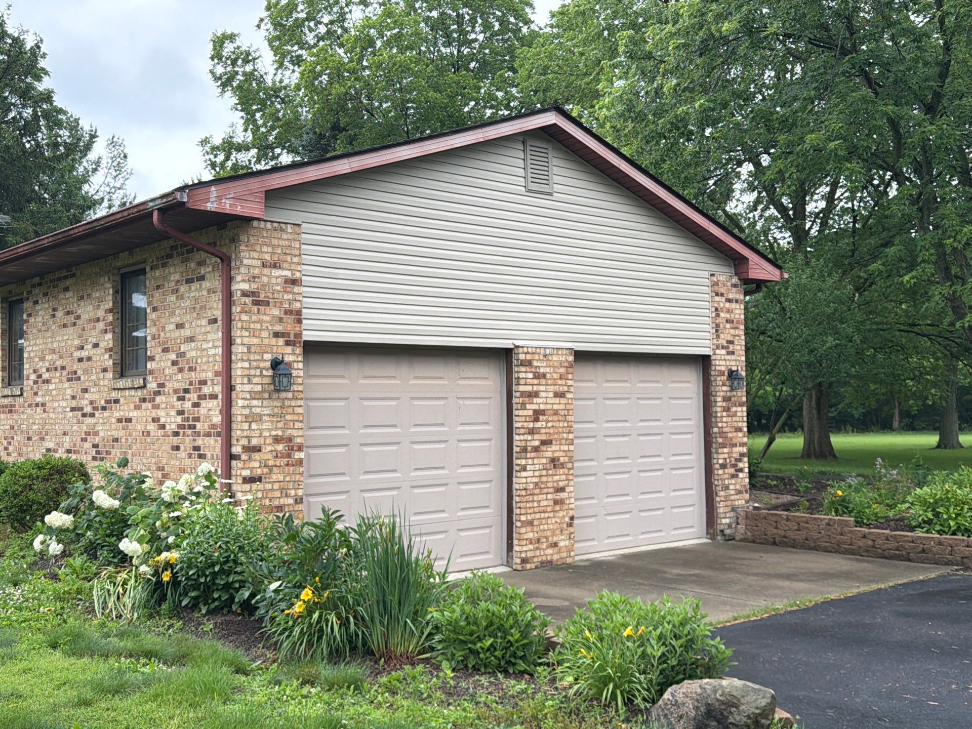 Angled view of the garage doors after storm restoration work in Dublin