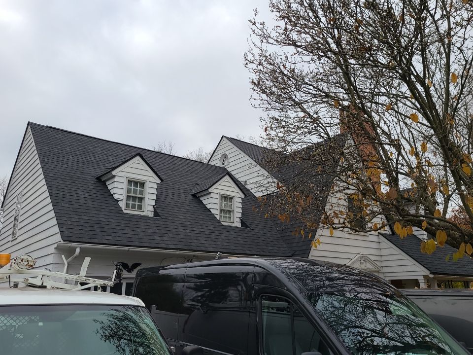 Front exterior before siding installation by 614 Exteriors