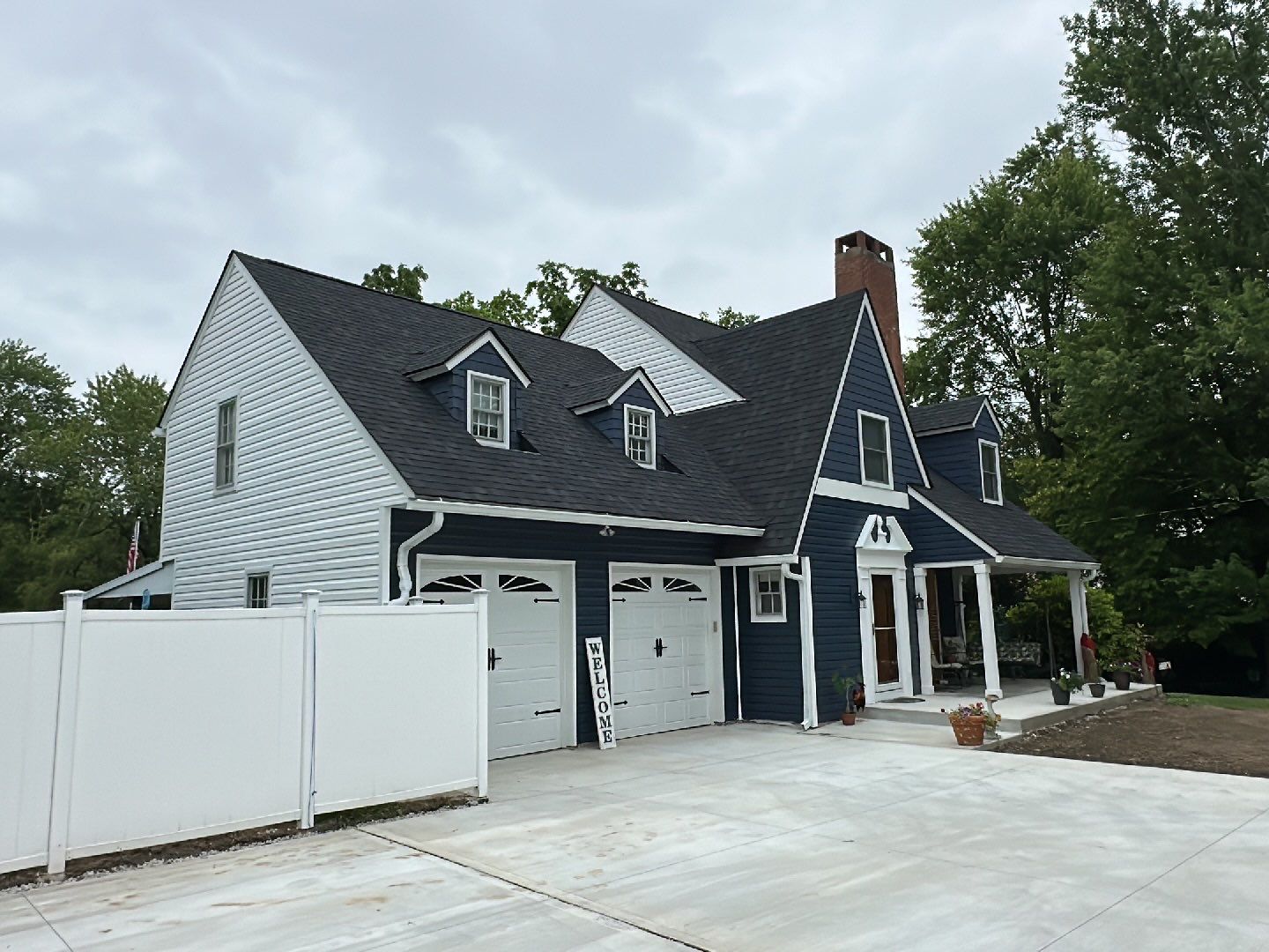 Finished exterior viewed from driveway after siding project