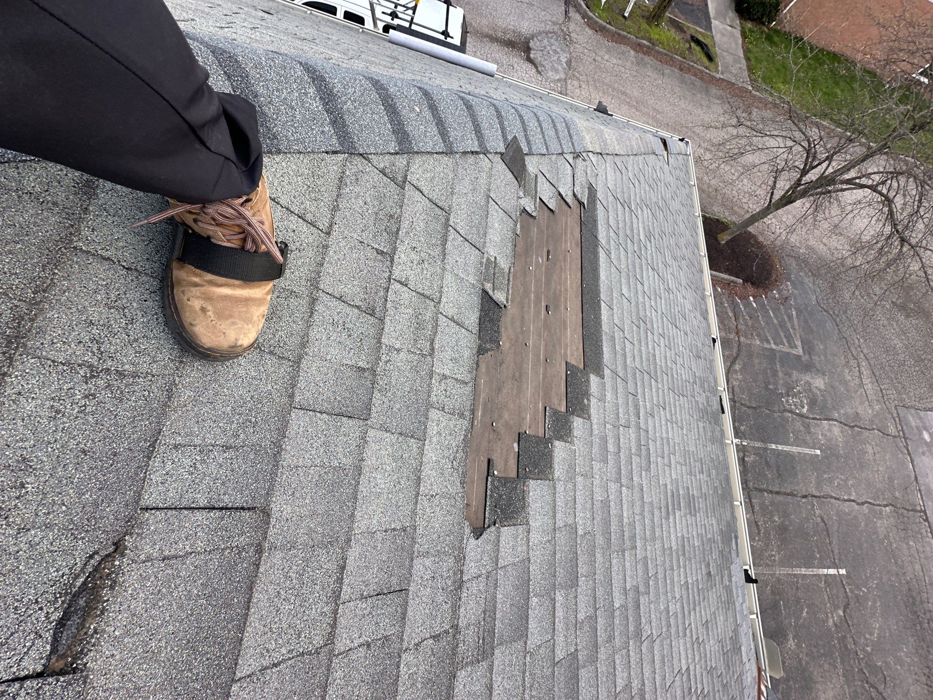 Detail of damaged shingles on the original Ohio Heart Group roof
