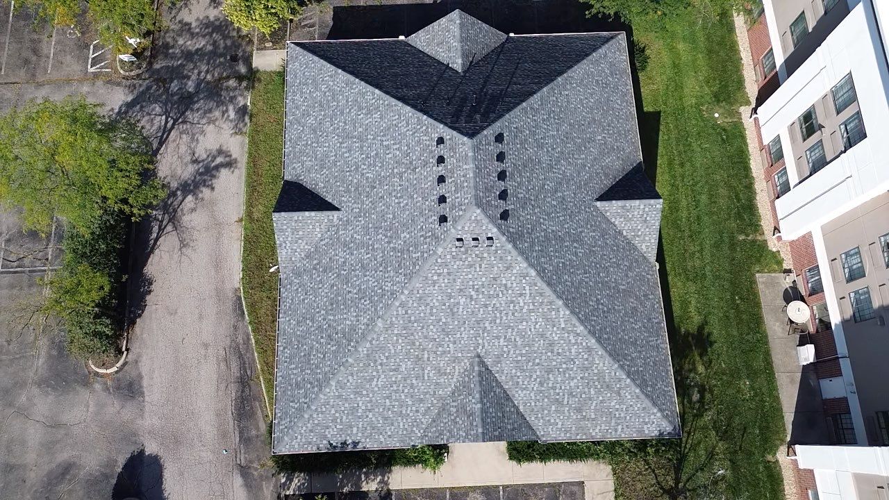 Overhead aerial view of the completed gray shingle roof on the Ohio Heart Group building