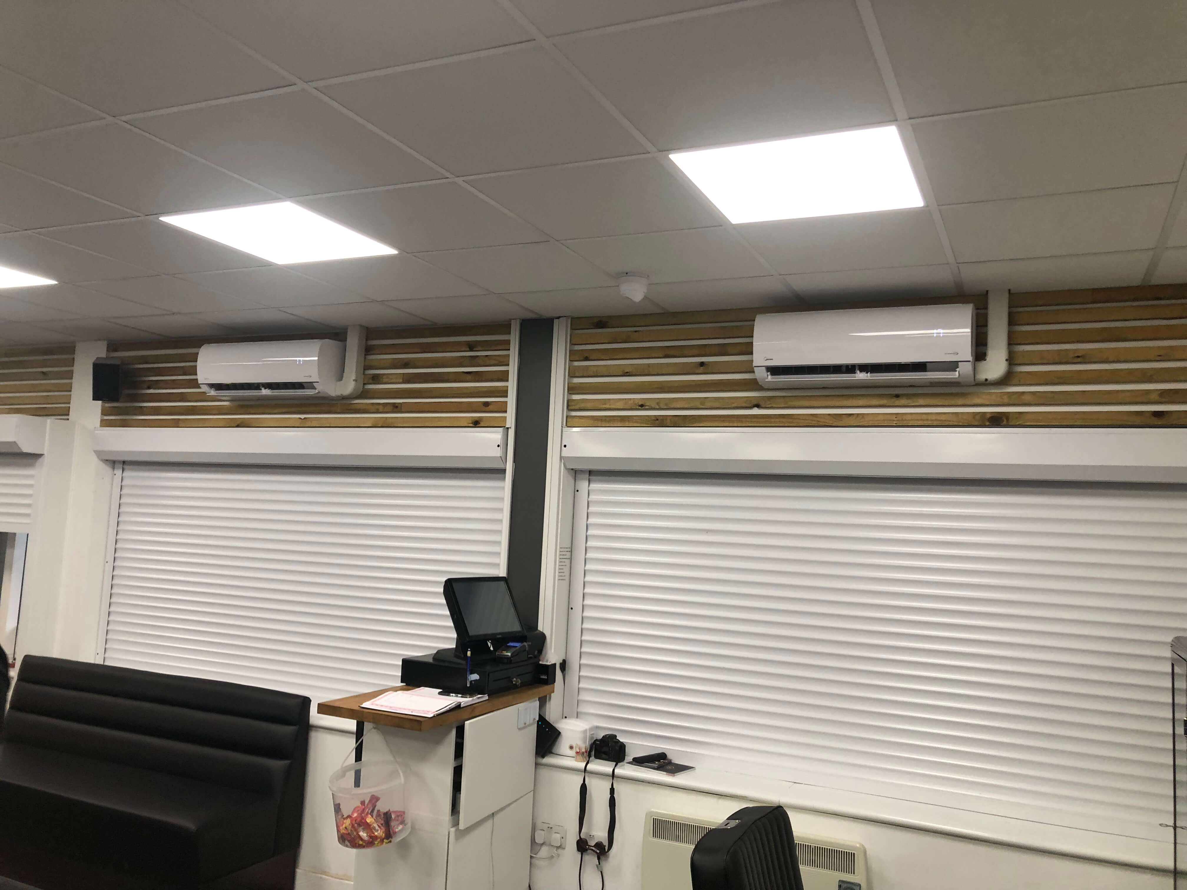 Wall-mounted systems installed in a commercial workspace