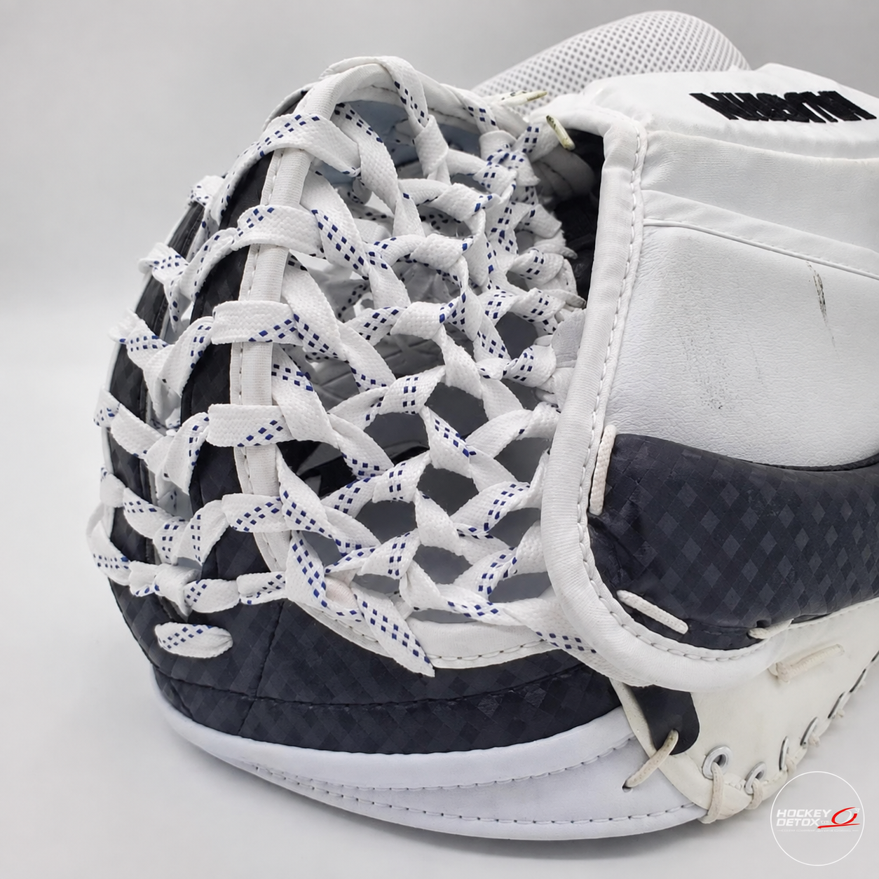 Detailed goalie catcher's pocket and pocket lacing from the Hockey Detox workshop