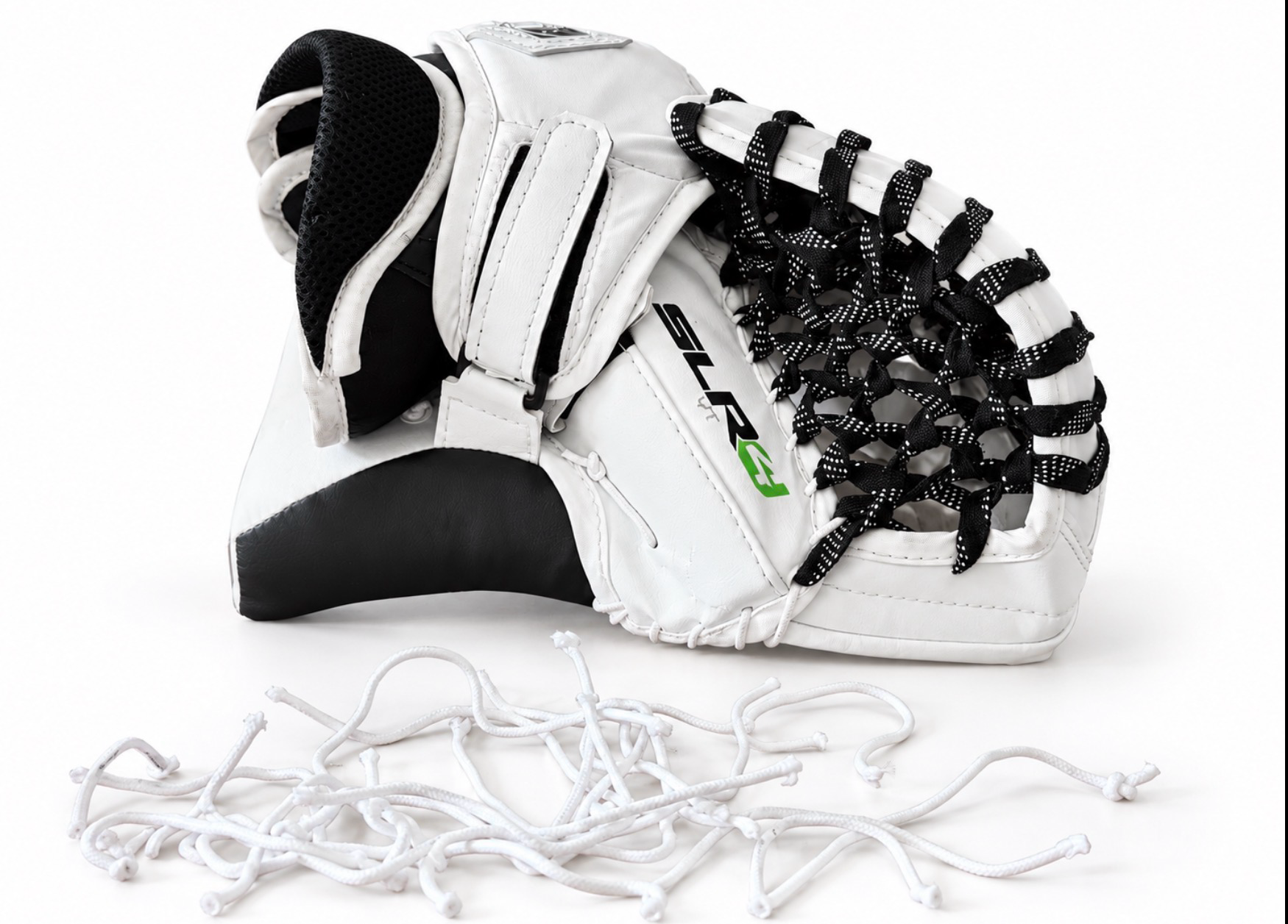 White Vaughn SLR4 glove with black laces and loose replacement laces