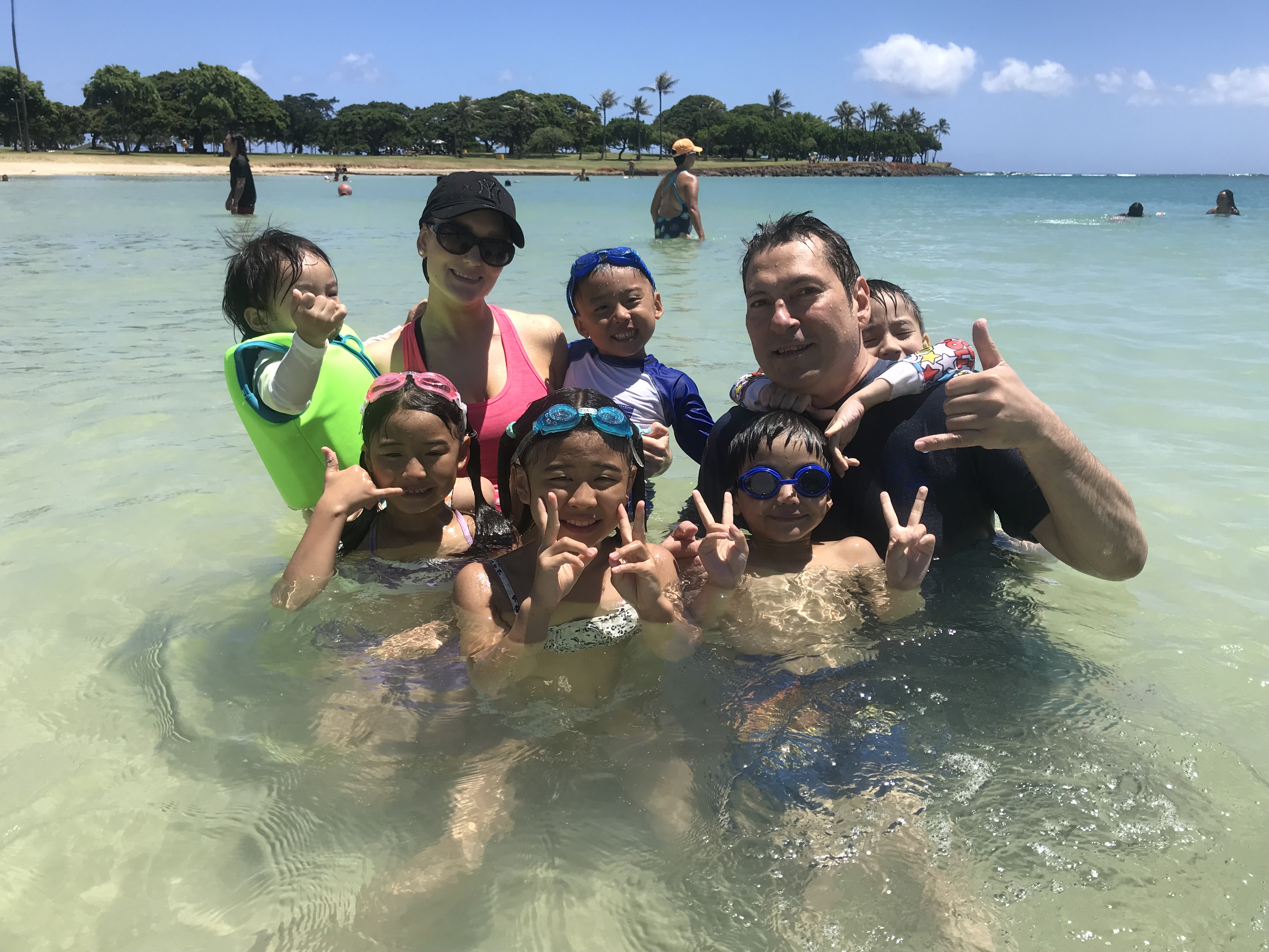 Jerry and Joy children together in shallow Hawaii waters